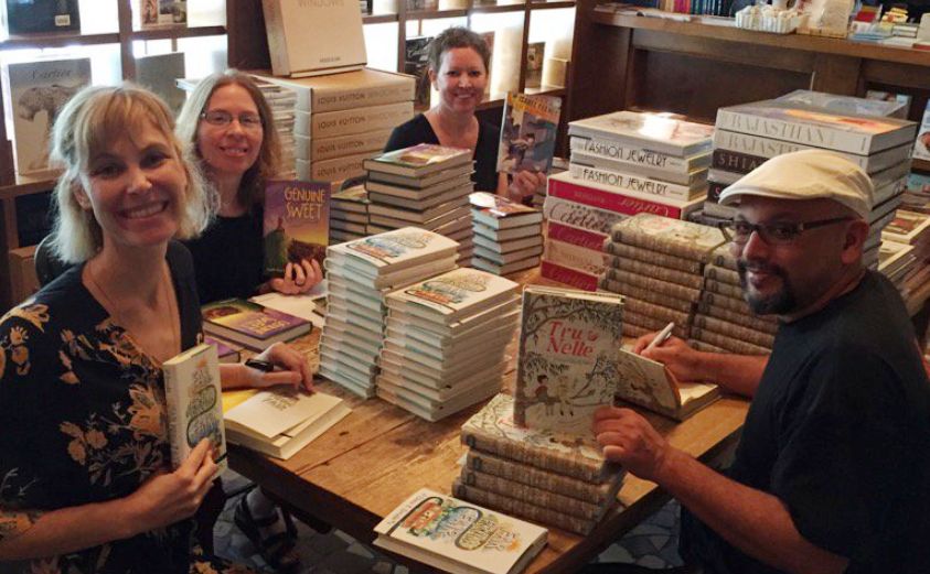  Faith Harkey signing books with other authors on book tour in Miami 